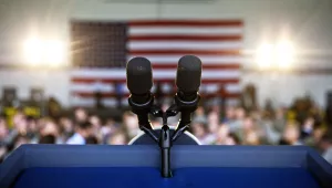 Microphones sit on a podium following Vice President Mike Pence’s speech at an event at Dobbins Air Reserve Base in Marietta, Ga., Friday, June 9, 2017.