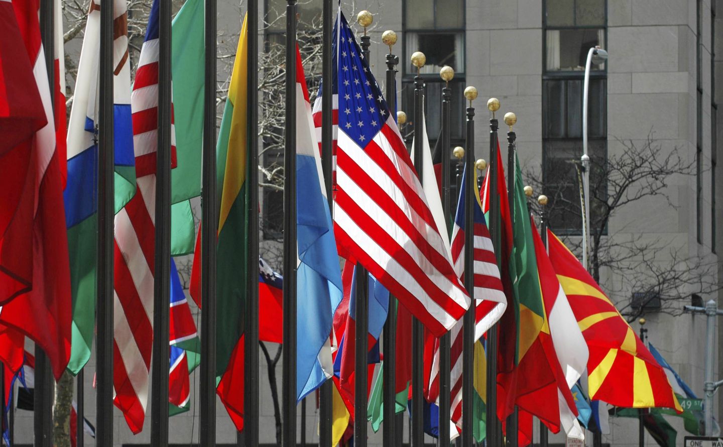 An American flag amongst flags of many nations.