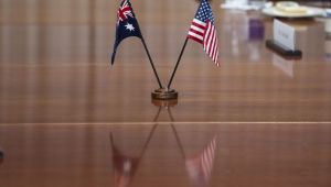 The countries' flags are seen on the table during a meeting between Secretary of Defense Lloyd Austin and Australian Deputy Prime Minister and Minister of Defense Richard Marles at the Pentagon, Monday, Dec. 5, 2022, in Washington.