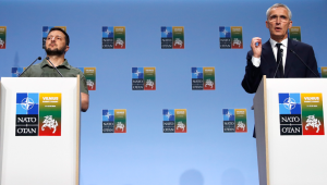 NATO Secretary General Jens Stoltenberg, right, and Ukraine’s President Volodymyr Zelenskyy address a media conference during a NATO summit