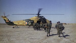 British troops board a helicopter