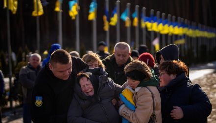 Valentyna Samoilenko reacts next to the body of her son Dmytro, 34, during his funeral