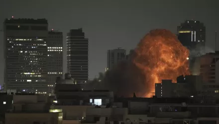An explosion is seen during a missile attack in Tel Aviv, Israel, Sunday, June 15, 2025.