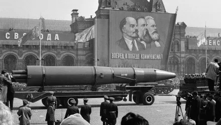 A naval rocket is exhibited in Moscow's Red Square past a banner of Vladimir Lenin, Friedrich Engels and Karl Marx during the annual May Day parade in the Soviet Union in May 1, 1963.