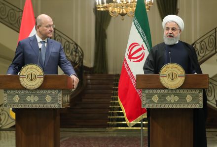 President Hassan Rouhani, right, speaks in a joint press briefing with his Iraqi counterpart Barham Salih after their meeting at the Saadabad Palace in Tehran, Iran, Saturday, Nov. 17, 2018