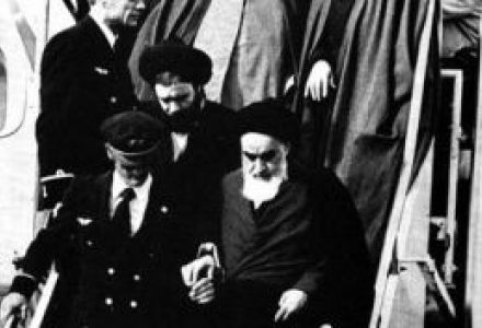 Ayatollah Khomeini returns to Iran after 14 years exile on February 1, 1979. He is helped off the plane by one of the Air France pilots.