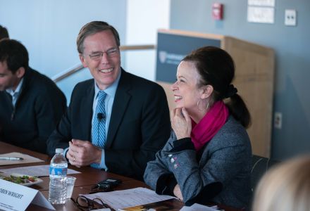 R. Nicholas Burns and Robin Wright laugh