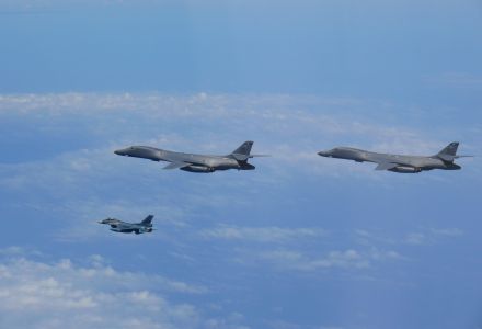 Two U.S. Air Force B-1B Lancers assigned to the 9th Expeditionary Bomb Squadron, deployed from Dyess Air Force Base, Texas, fly with a Koku Jieitai (Japan Air Self-Defense Force) F-2 fighter jet over the East China Sea, July 7.