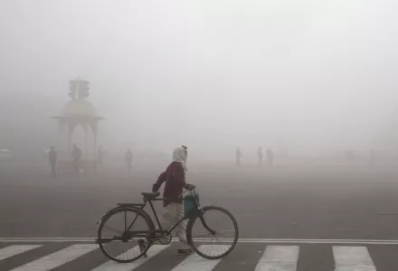 A 2019 photo shows a cyclist amidst morning smog in New Delhi, India.