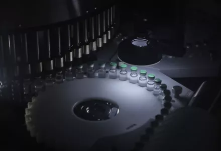 Image of vials inside of a device used in biological research.