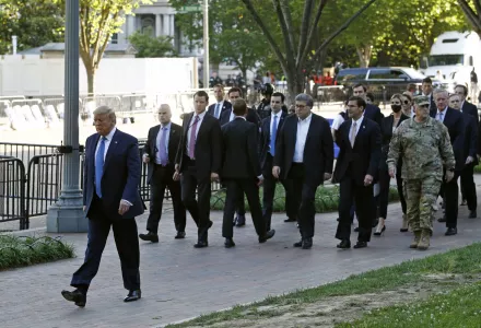 Photo of President Donald Trump, Secretary of Defense Mark Esper, and others walk in Lafayette Park for a photo outside St. John's Church across from the White House Monday, June 1, 2020, in Washington.