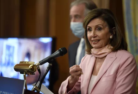 House Speaker Nancy Pelosi of Calif., right, standing next to Rep. Richard Neal, D-Mass., left, speaks during an event on Capitol Hill in Washington, Thursday, June 18, 2020. They unveiled the Moving Forward Act, which aims to rebuild America's infrastructure. 