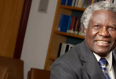 A photo portrait of Calestous Juma in the Belfer Center Library.