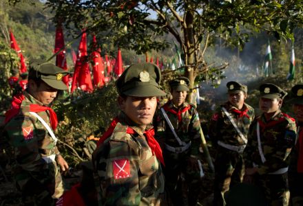 In this Jan. 12, 2015 photo, officers with the Ta’ang National Liberation Army gather in the steep hillside jungles in Mar Wong, a village in northern Shan state, Myanmar. 