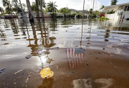 An American flag submerged in floodwaters from hurricane Helene.